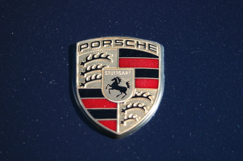 a close up of a car's emblem on the hood