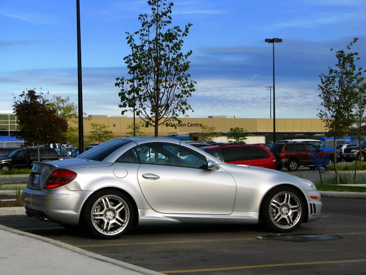 an image of car parked in lot with cars