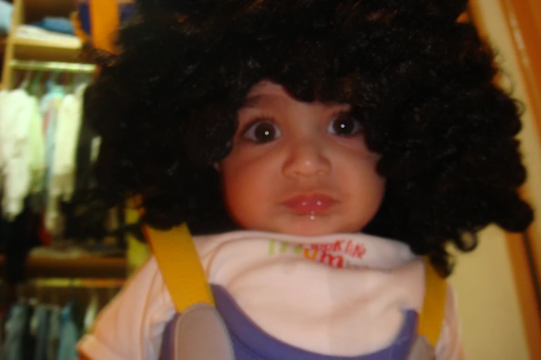 an image of a child with curly hair