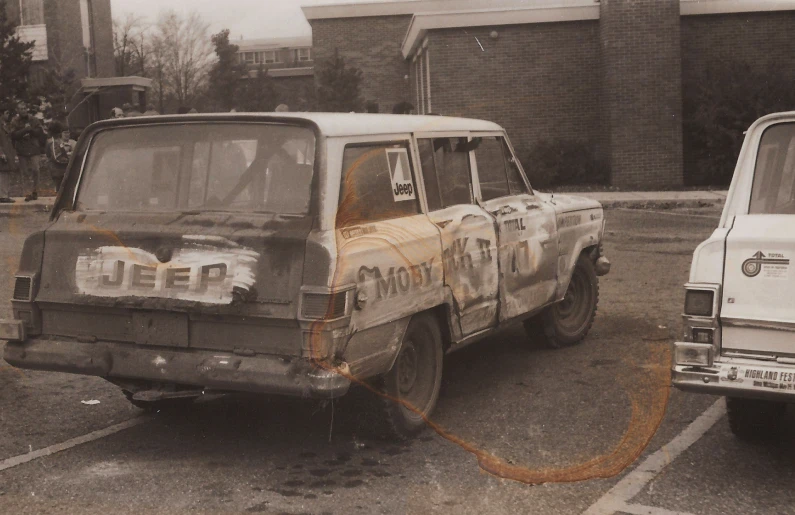 an old pick up truck is plugged in and drives away