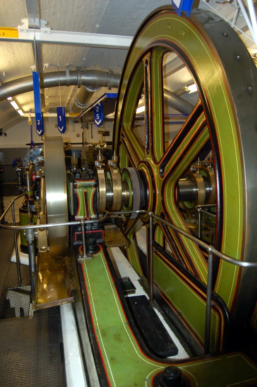 a large metal machine with a long conveyor belt