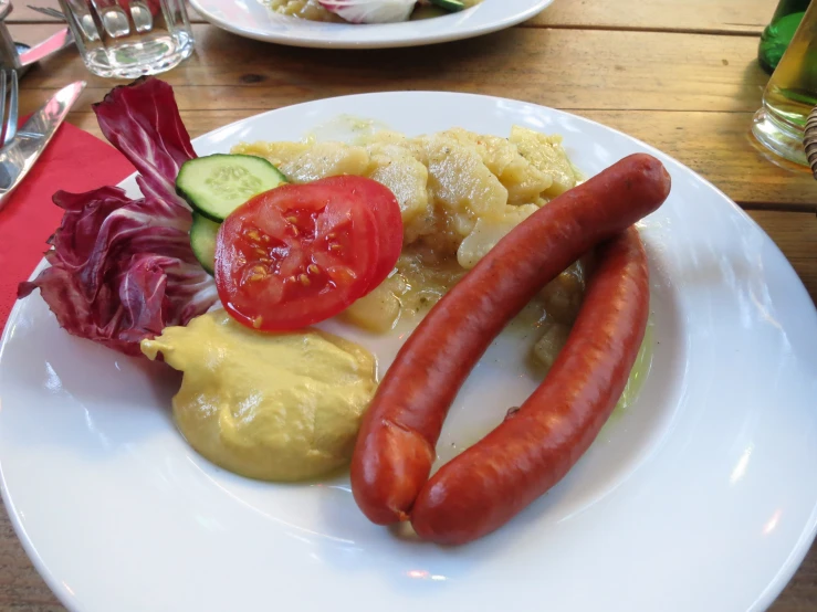 a  dog and vegetables served with er