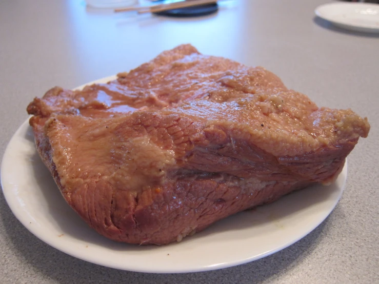 a piece of cooked meat on a plate