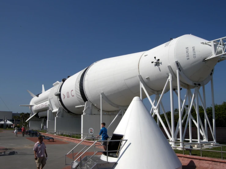 some white rockets sit next to one another