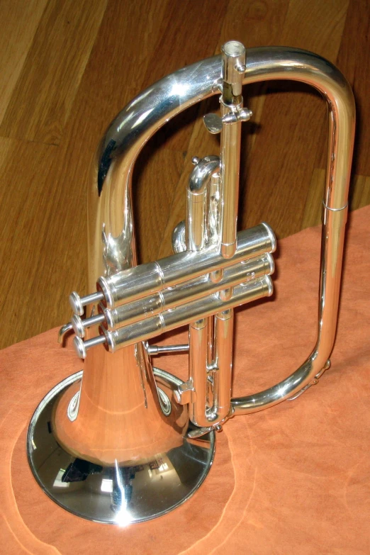 there is an old metal instrument with four sides