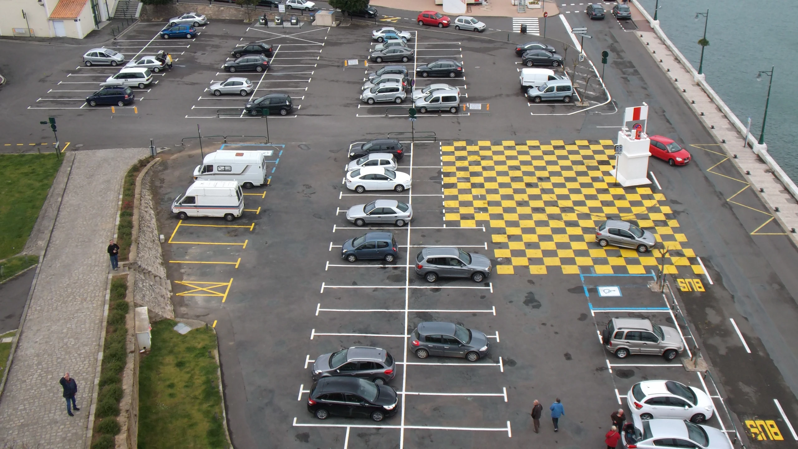 an aerial s of a parking lot full of cars