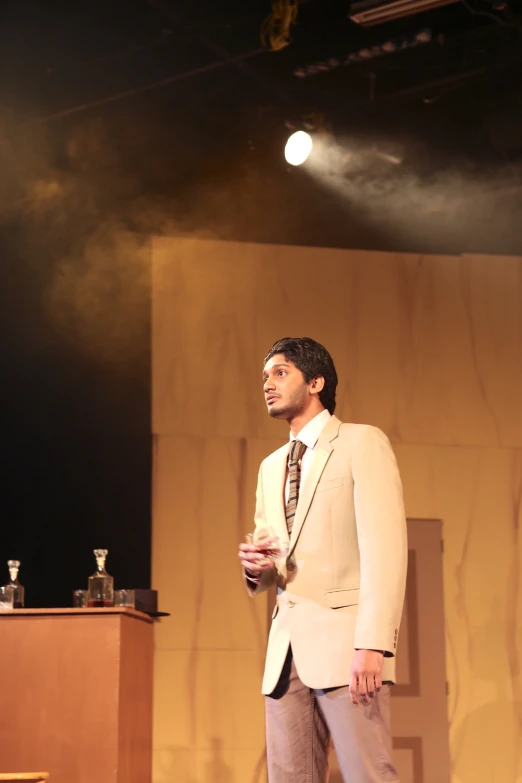 a man is standing in front of a podium