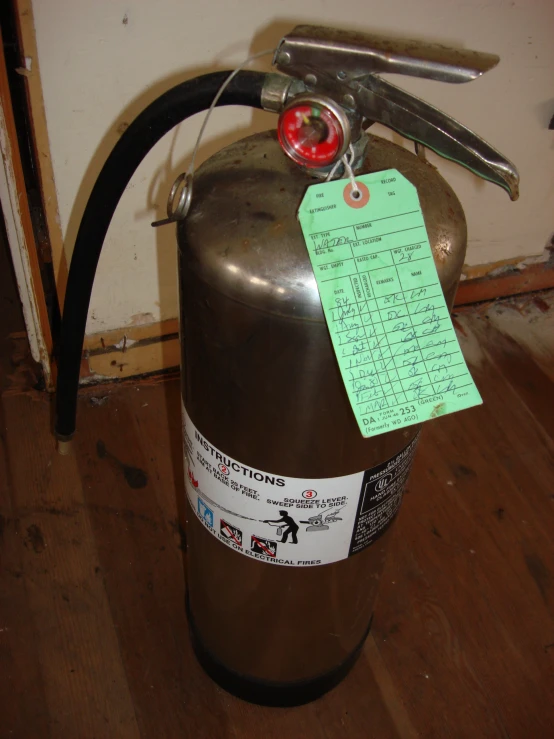 a small propane bottle with a price tag on the back