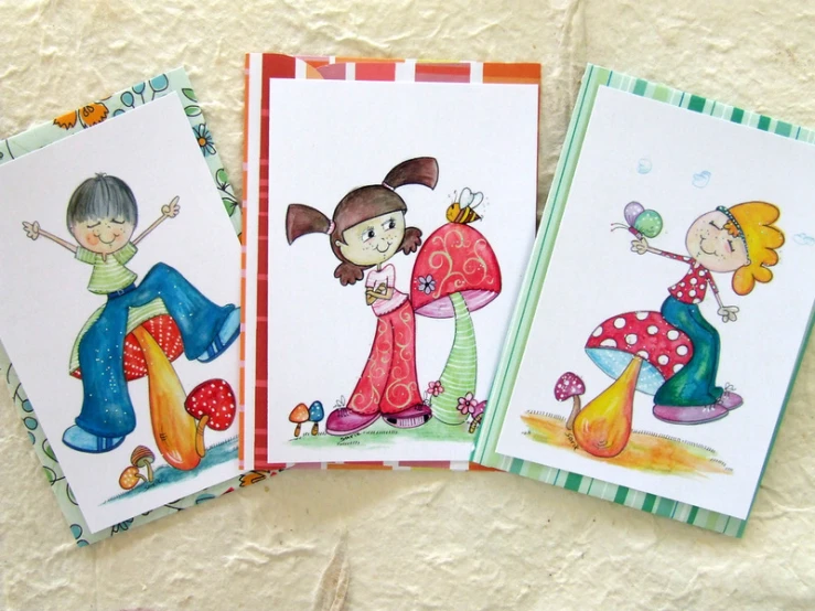 three card sets with childrens pictures of a girl and a boy