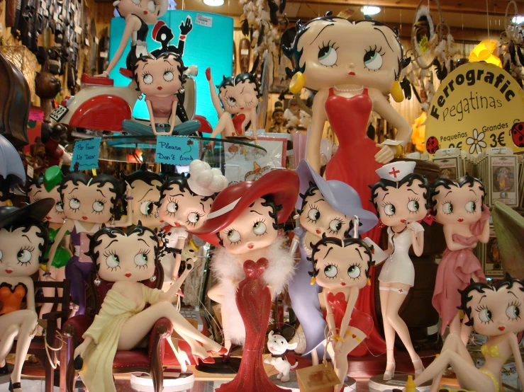 a group of toy dolls that are on display