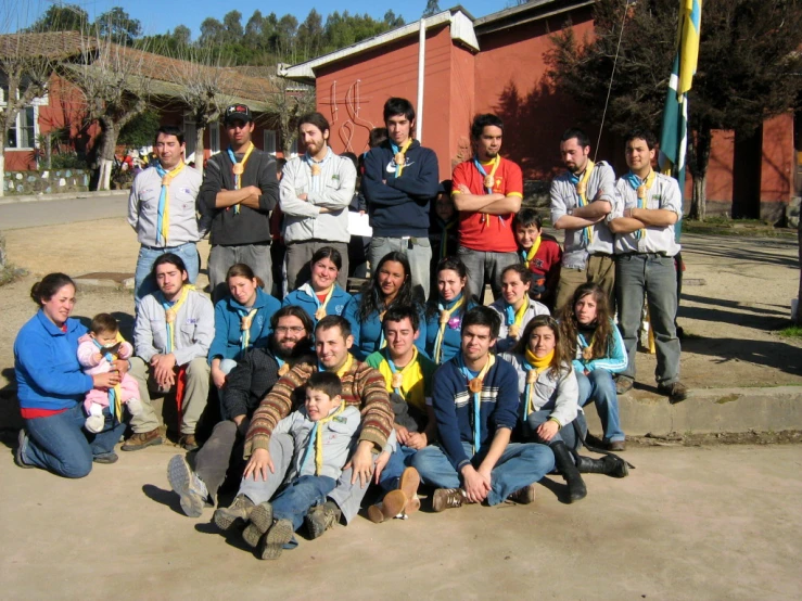 people wearing medals are standing together on steps