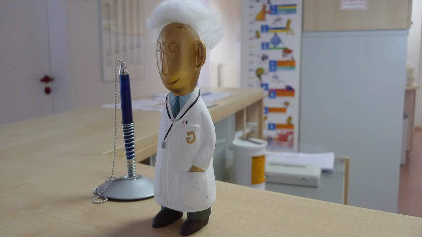 a toy of a doctor has been placed on a table