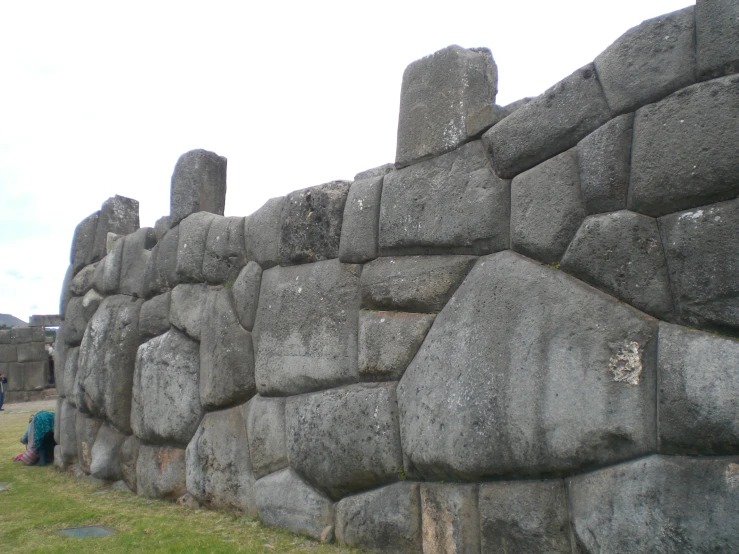 a large stone wall with several different sizes and shapes