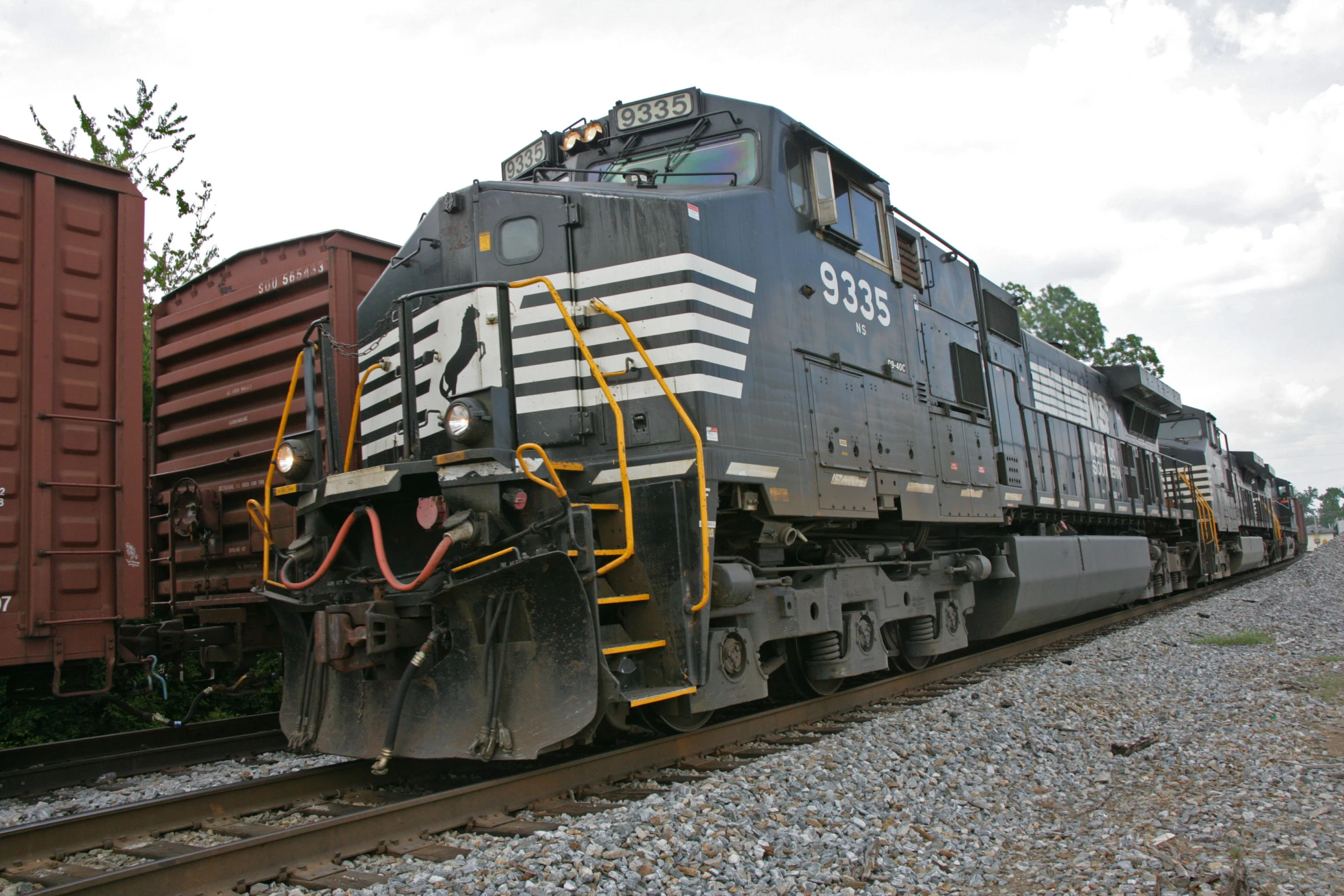 this is a train engine on the tracks with another on it