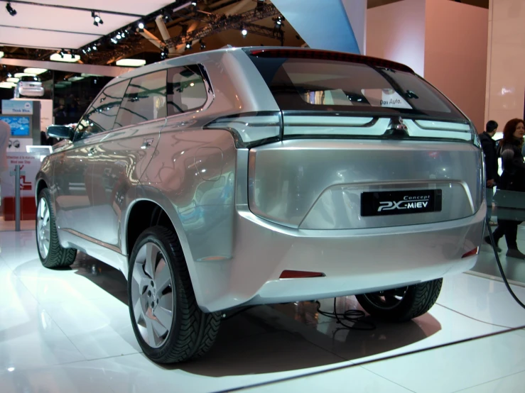 an electric vehicle that is on display at an automobile show