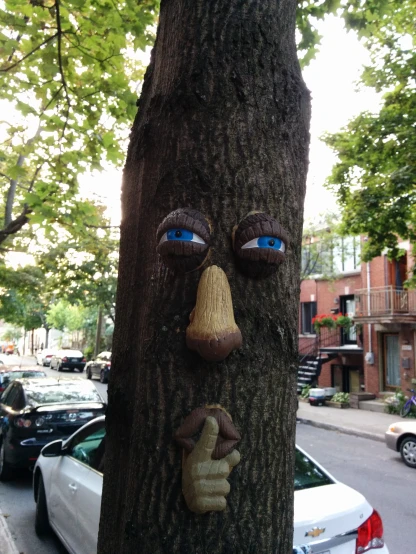 the face of a man is made out of a tree