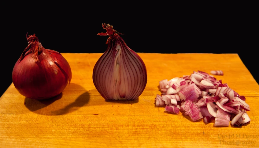 onions, onion, and garlic are on a  board