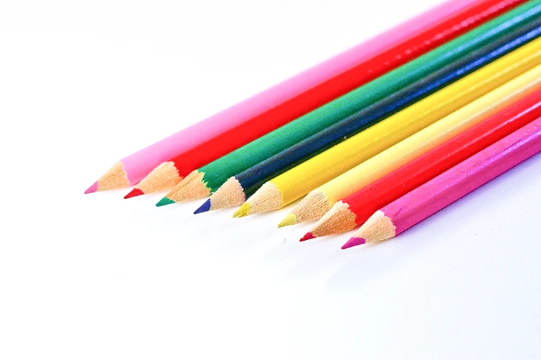 colored pencils lined up next to each other