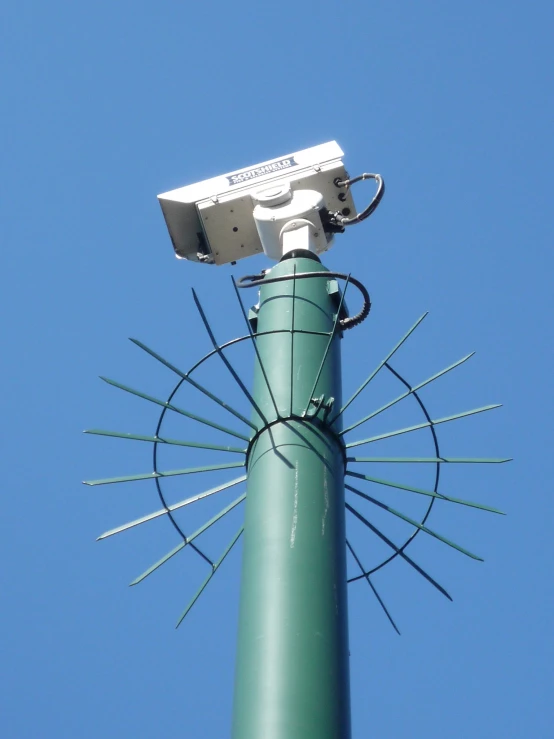 a pole with a camera attached to it