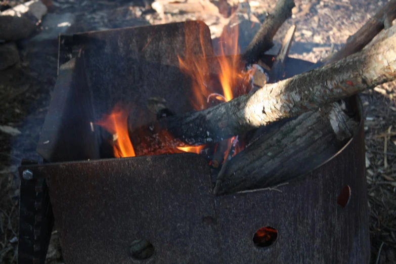 the fire is blazing while sitting in a container