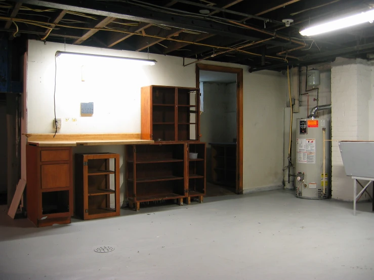 a room with shelves and shelving inside