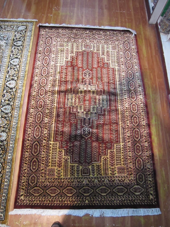 a rug sitting on top of a wooden table