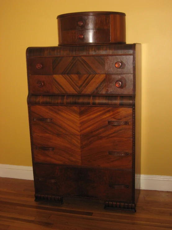 an old dresser made out of wooden, with ons on it