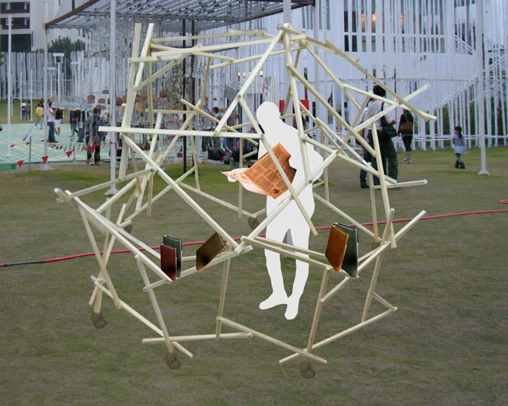 a man hanging upside down on a wooden structure