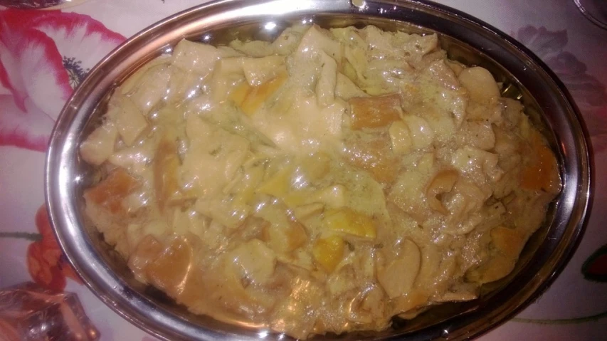 a bowl full of food is sitting on a table