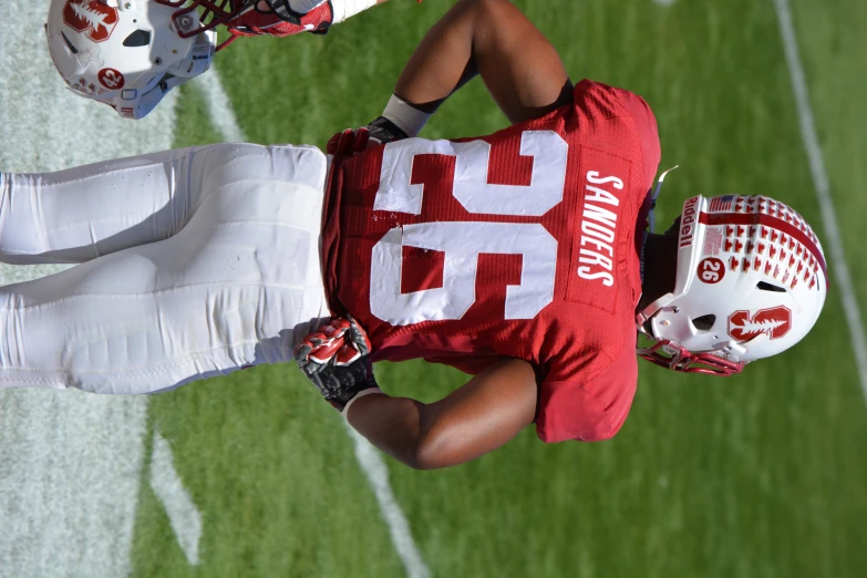 a person is getting ready to play some football