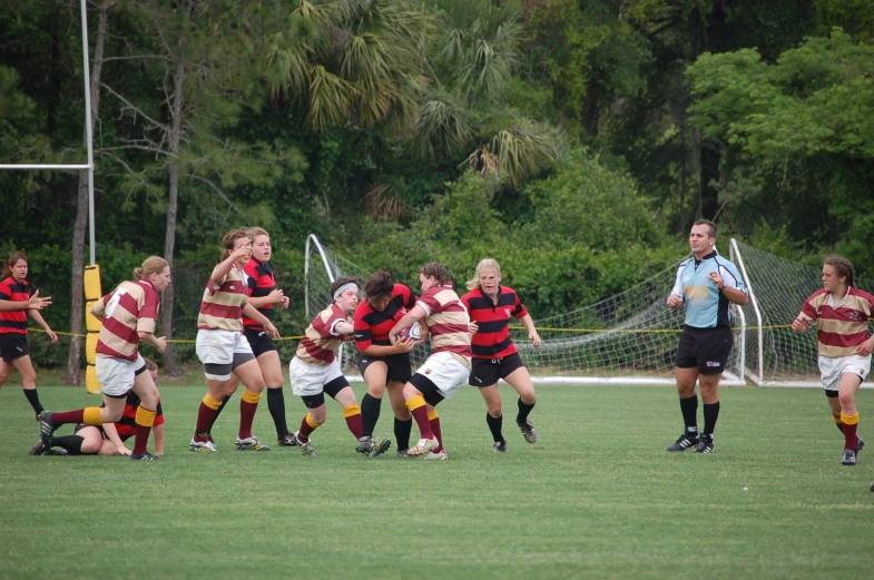 a group of people playing a game of soccer