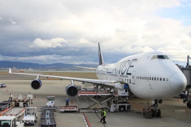 a large airplane sitting on top of an airport tarmac