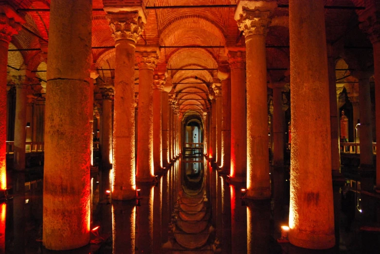 the inside of a large building with many columns