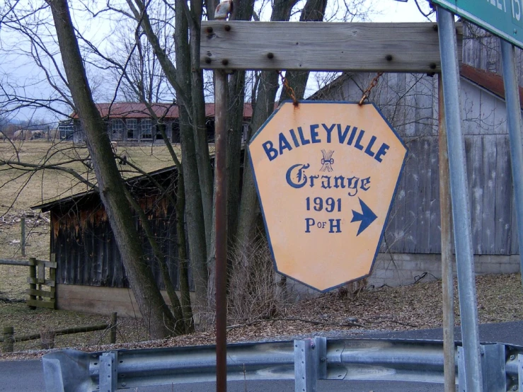 an old looking sign at the entrance to baileyville cemetery