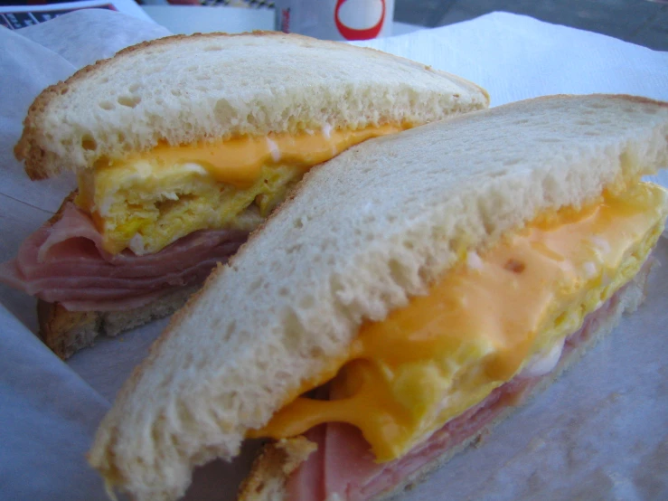 the sandwich has been made with egg and ham