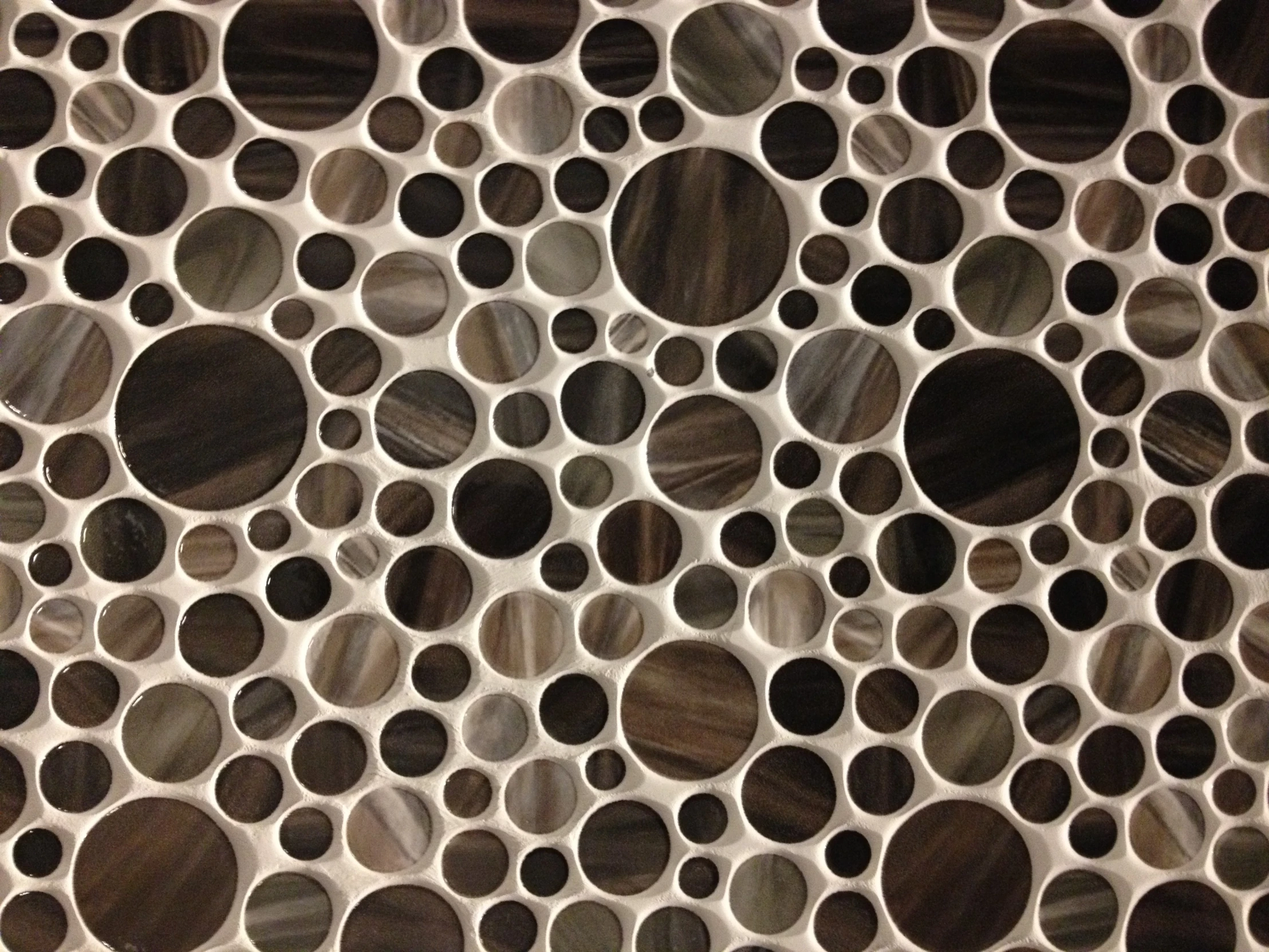 a close up po of a decorative pattern made of rocks