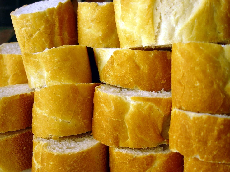 close up of many pieces of bread piled on each other