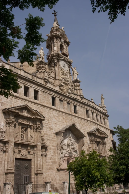 an old church with stone architecture and many sculptures