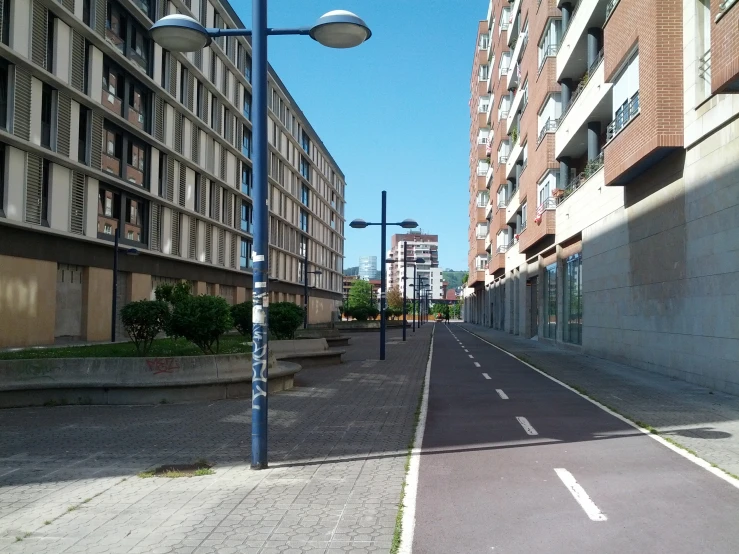 a view down an empty street from a high rise building