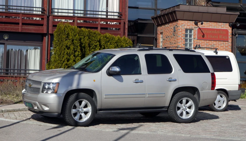 a suv parked on the side of the road