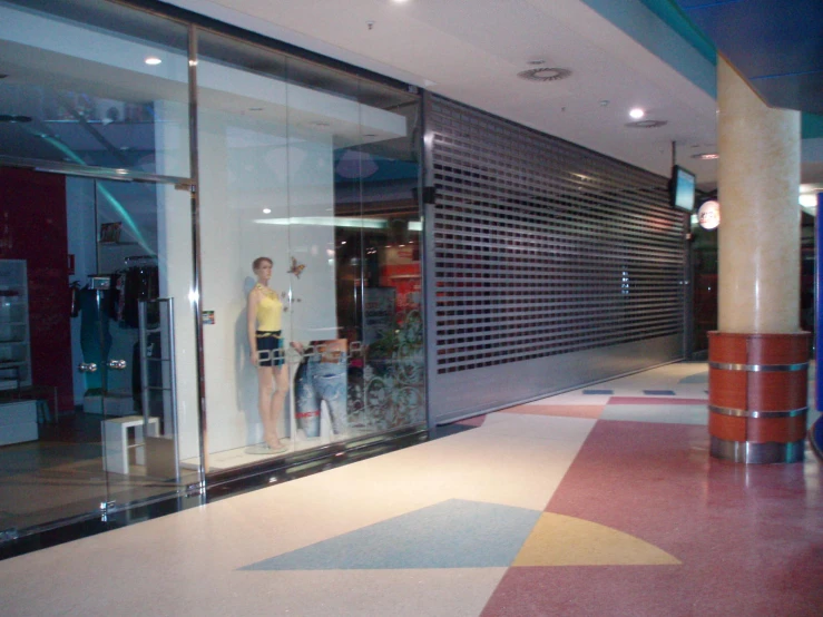 two people are standing at the entrance to a building