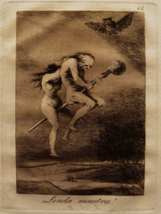 the woman is flying through the air with an object in her hands