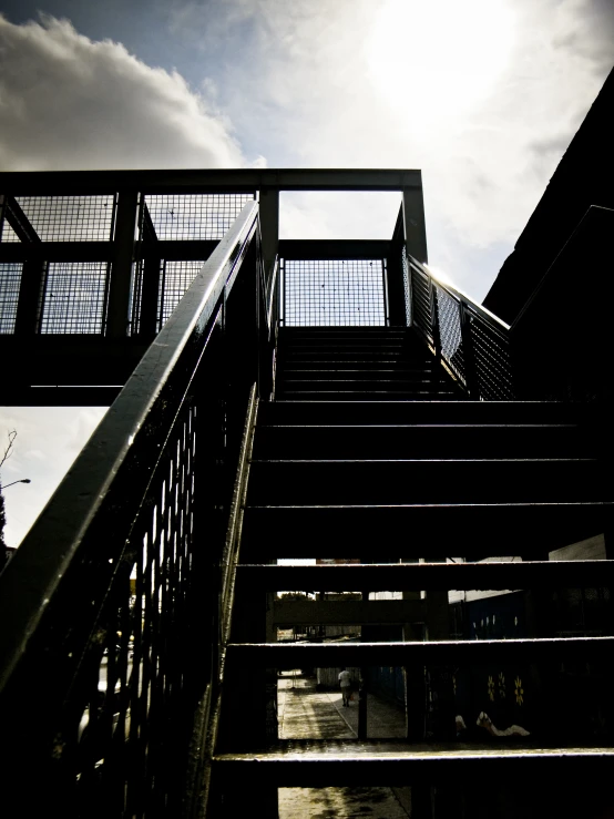 the metal steps and railings have been used to create this dramatic view