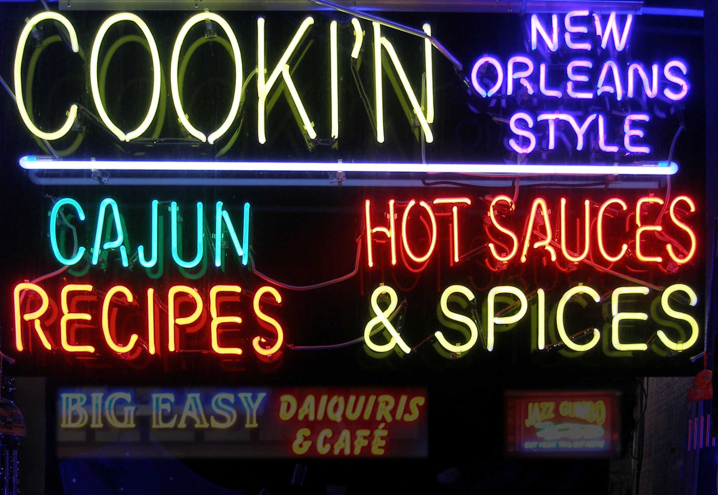 colorful neon sign of restaurant in dark place