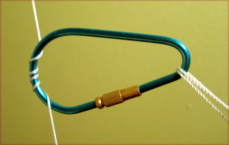 a pair of cable with a copper head pin attached