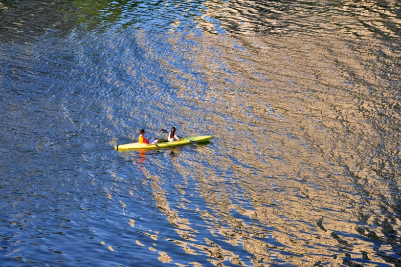 people are on their own canoe and are relaxing in the sun