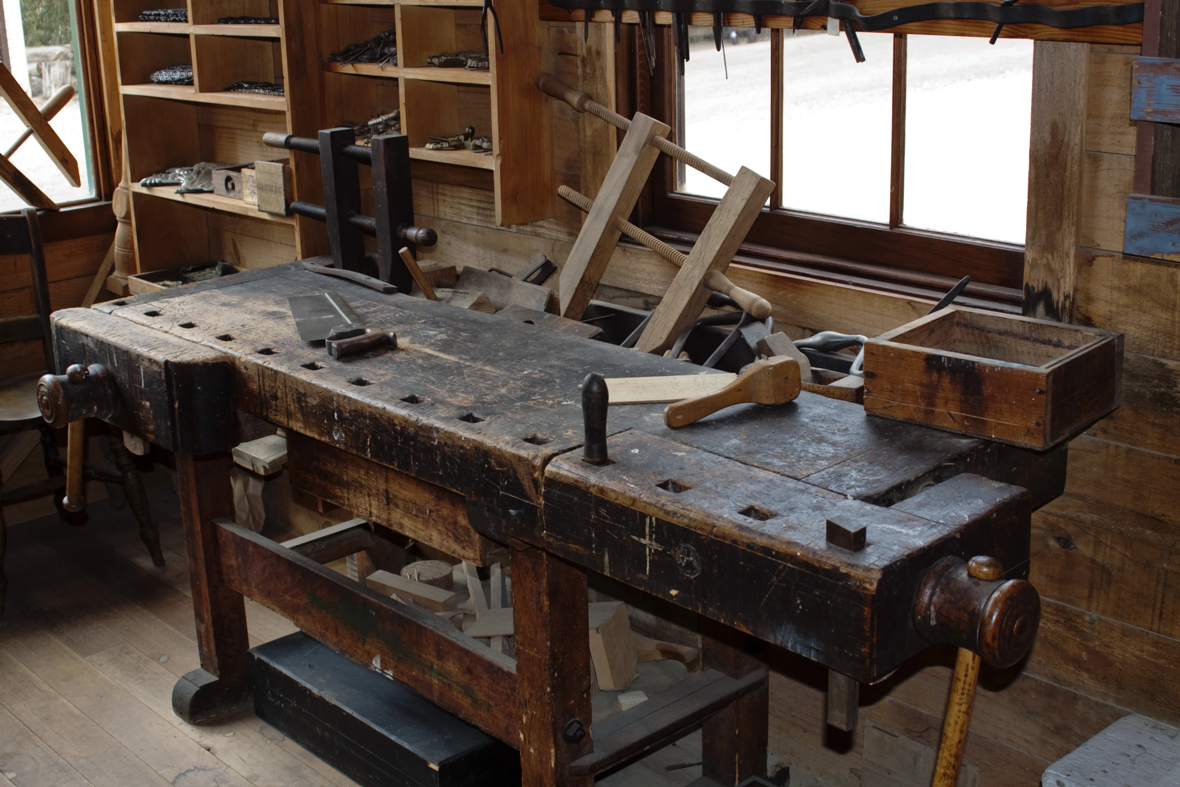 an old wood working bench made of scrap metal