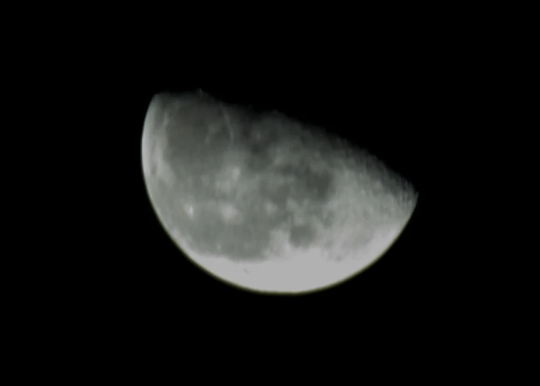 a close up of the surface of the moon at night