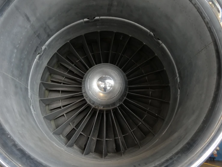 an airplane engine with it's turbine facing the camera