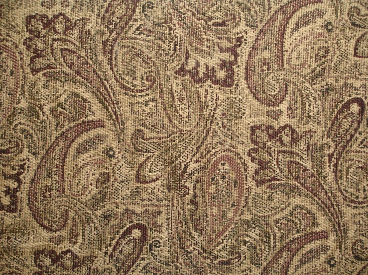 some different brown and pink patterns on a cloth